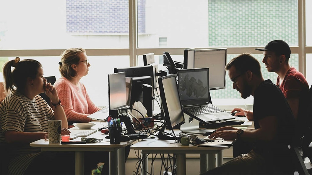 A group of people working in logistics tech startups.