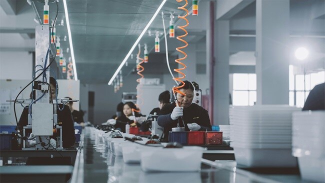 Women workers in Asia on a production line