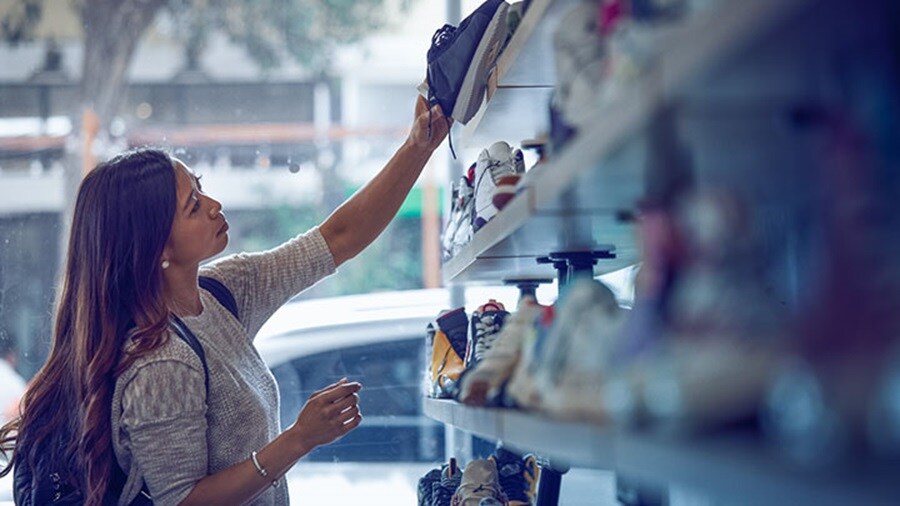 Young woman shopping footwear